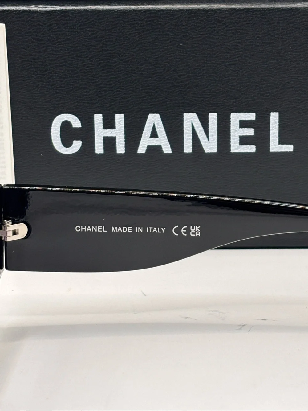 CHANEL Black Shield Sunglasses with Purple Gradient Lenses